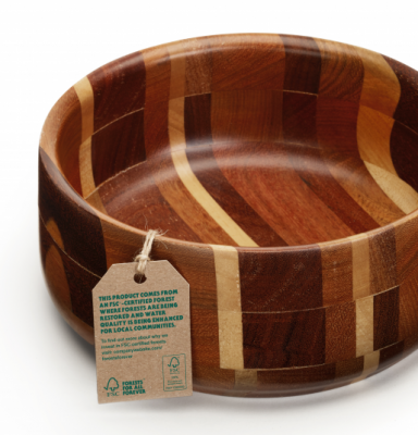 a wooden bowl with FSC tag